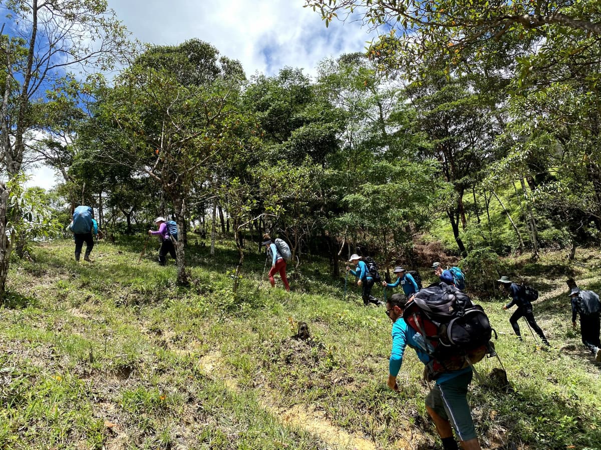 Hikers making their way through the rocky paths of Vale do Pati