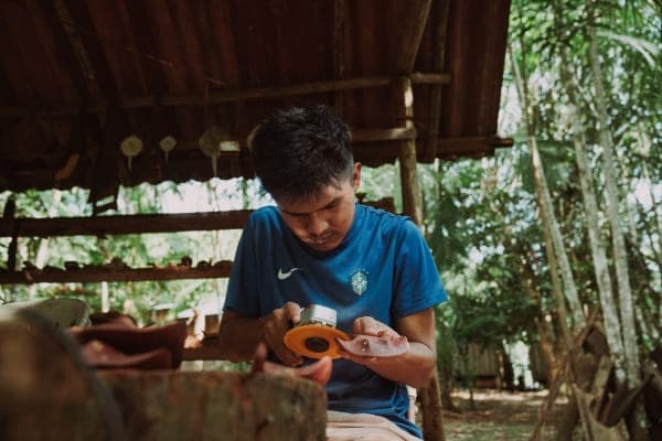 Community-led ecotourism scene deep in the Amazon rainforest