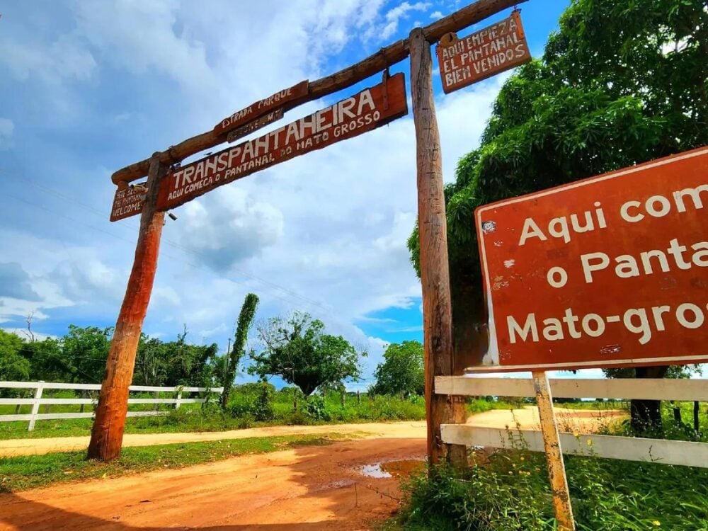 A rustic wooden gate marks the entrance to the Transpantaneira Highway. This landmark is essential for those learning how to get to the Pantanal from the North Pantanal side. A rustic wooden gate marks the entrance to the Transpantaneira Highway. This landmark is essential for those learning how to get to the Pantanal from the North Pantanal side.
