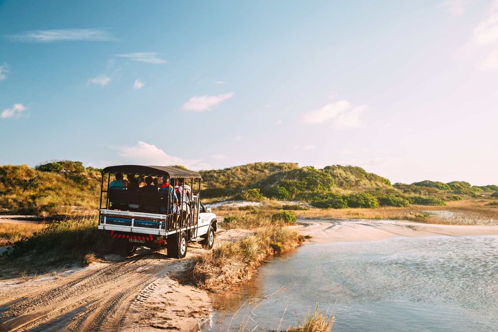 This is how you earn the lagoon views: packed in a truck, wind in your face, grinning. Photo: cokada Photo 2
