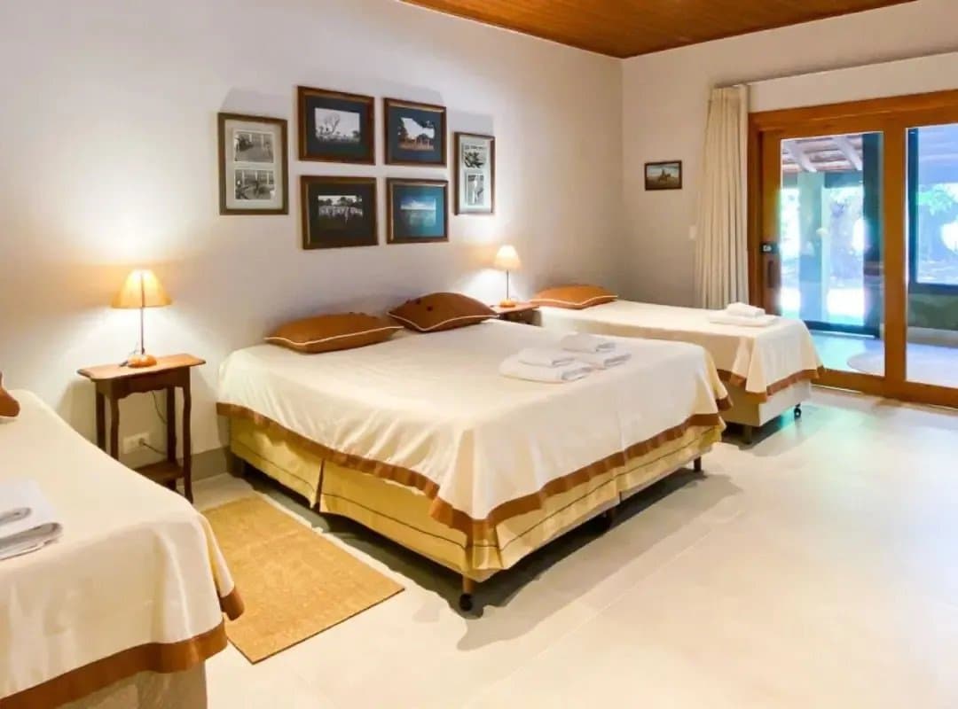 Clean sheets, warm light, and a garden just outside, your kind of field station. Photo 2