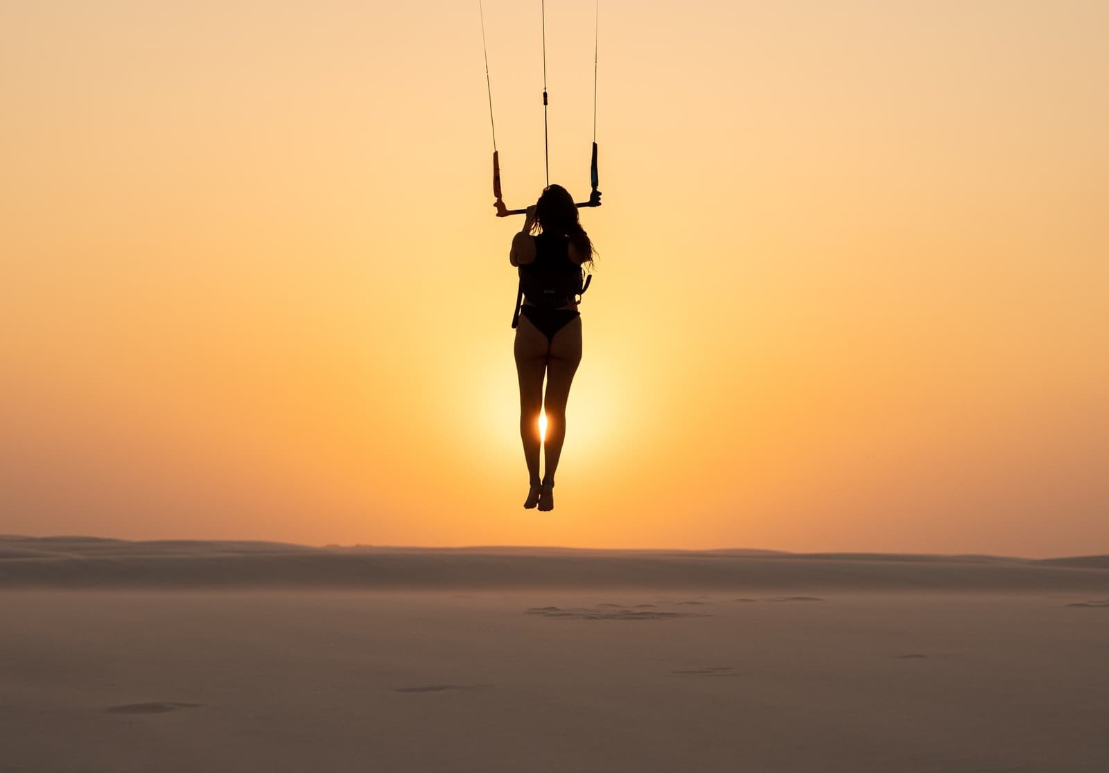 Held up by nothing but wind and nerve, right at golden hour. Photo 6