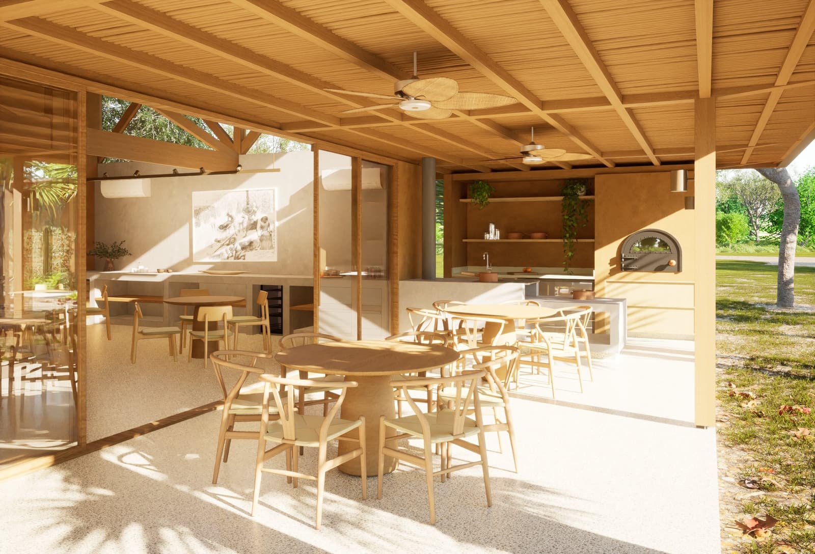 Good food, a wood-fired oven, and the Pantanal just beyond the trees. Open-air dining pavilion at a pantanal luxury safari lodge, featuring round wooden tables with wishbone chairs, a wood-fired oven, open kitchen shelving with trailing plants, slatted timber ceiling with palm-leaf fans, and lush green grounds visible beyond