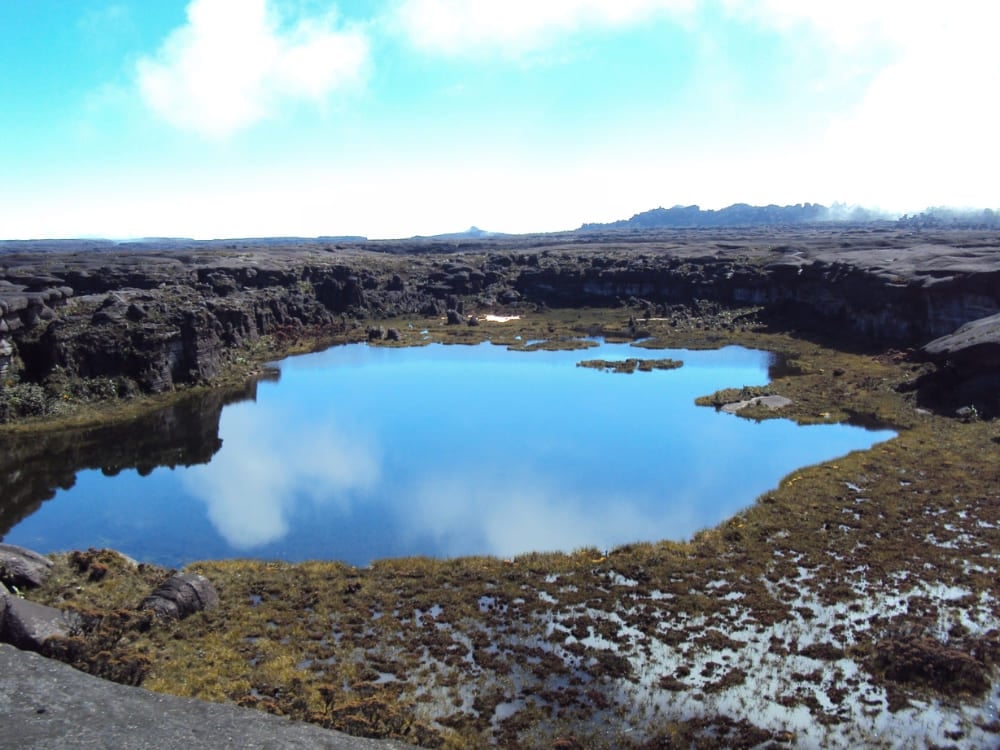A dark natural pool on the summit plateau of Mount Roraima A dark natural pool on the summit plateau of Mount Roraima