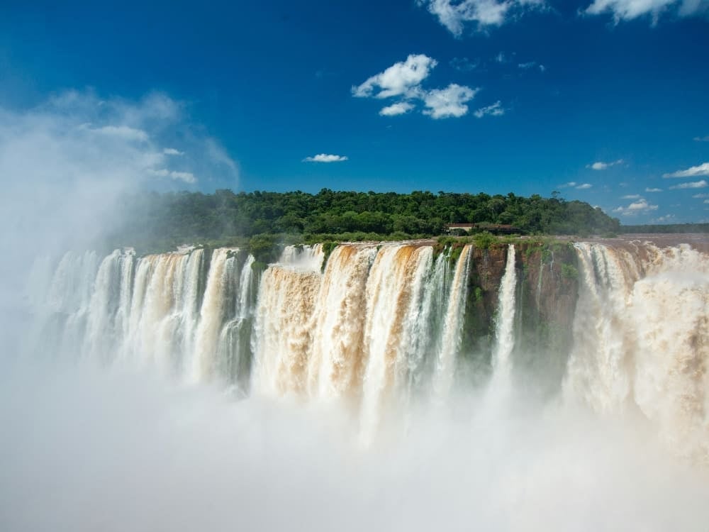 The Devil's Throat at Iguazu Falls, a wall of high-volume cascades under a cloud of spray, Brazil. The Devil's Throat at Iguazu Falls, a wall of high-volume cascades under a cloud of spray, Brazil.