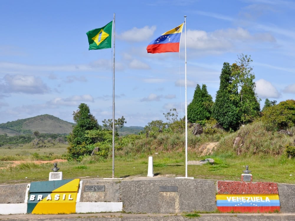 The Brazil–Venezuela border marker with both national flags, on the crossing used to reach Mount Roraima The Brazil–Venezuela border marker with both national flags, on the crossing used to reach Mount Roraima