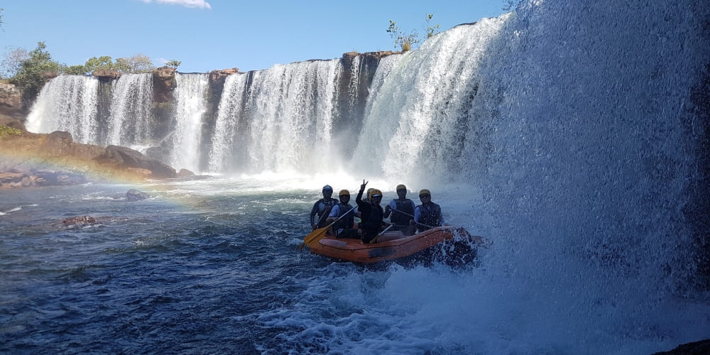 A group of people enjoys a Class II rafting adventure on the Soninho River during a 4-day Jalapão tour.