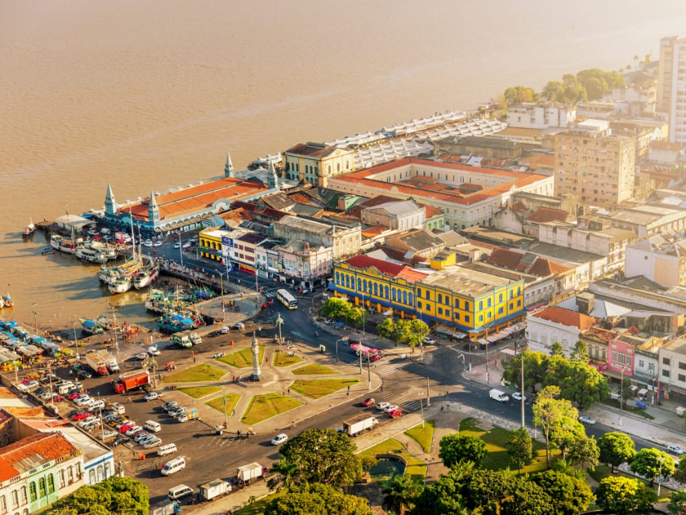 Aerial view of the historic Ver-o-Peso market and docked boats on the riverfront in Belém do Pará. Aerial view of the historic Ver-o-Peso market and docked boats on the riverfront in Belém do Pará.
