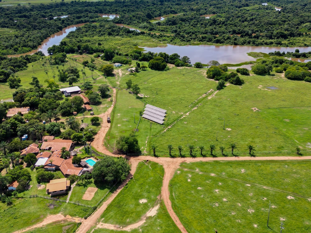 Aerial view of Araras Lodge showing the swimming pool and eco-friendly infrastructure surrounded by the Pantanal ecosystem