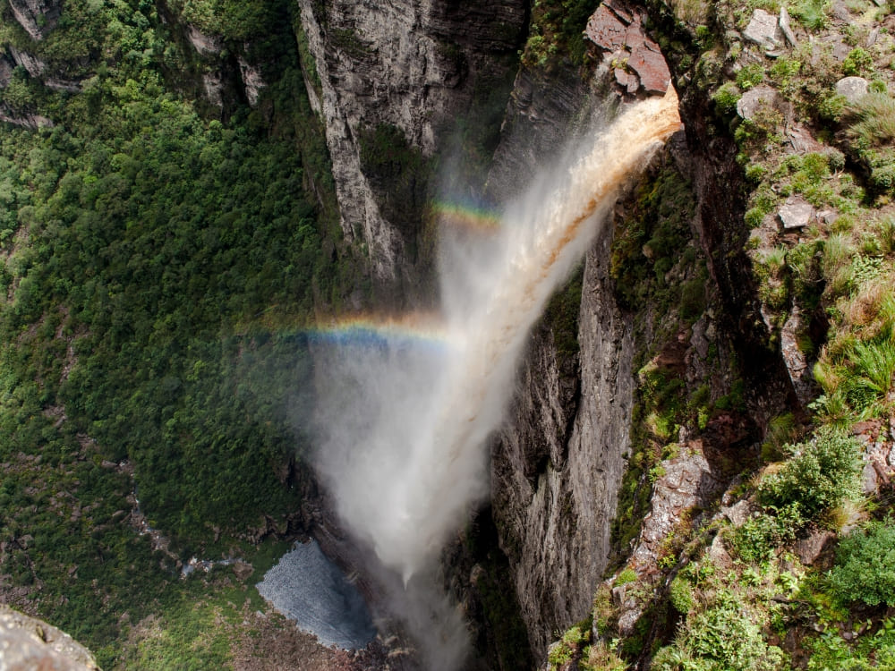 Fumaça waterfall in Chapada Diamantina with rainbow.