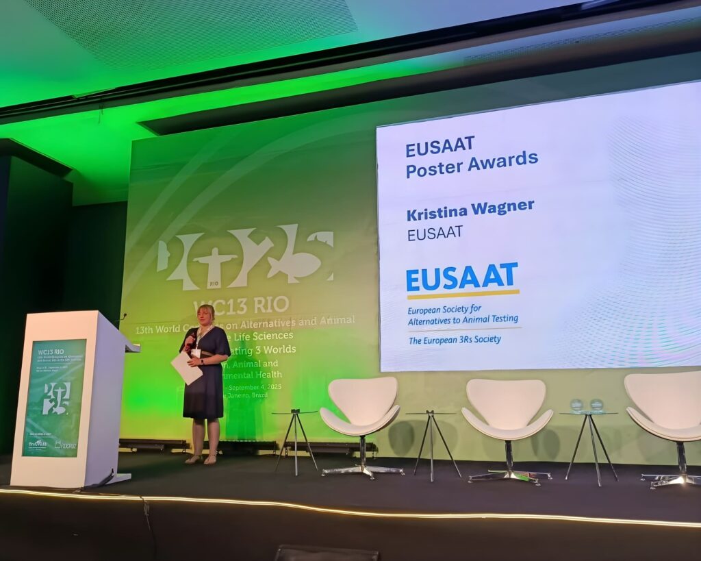 Biologist Kristina Wagner stands on stage presenting at the EUSAAT scientific conference in Rio de Janeiro before her Brazilian ecotourism adventure.